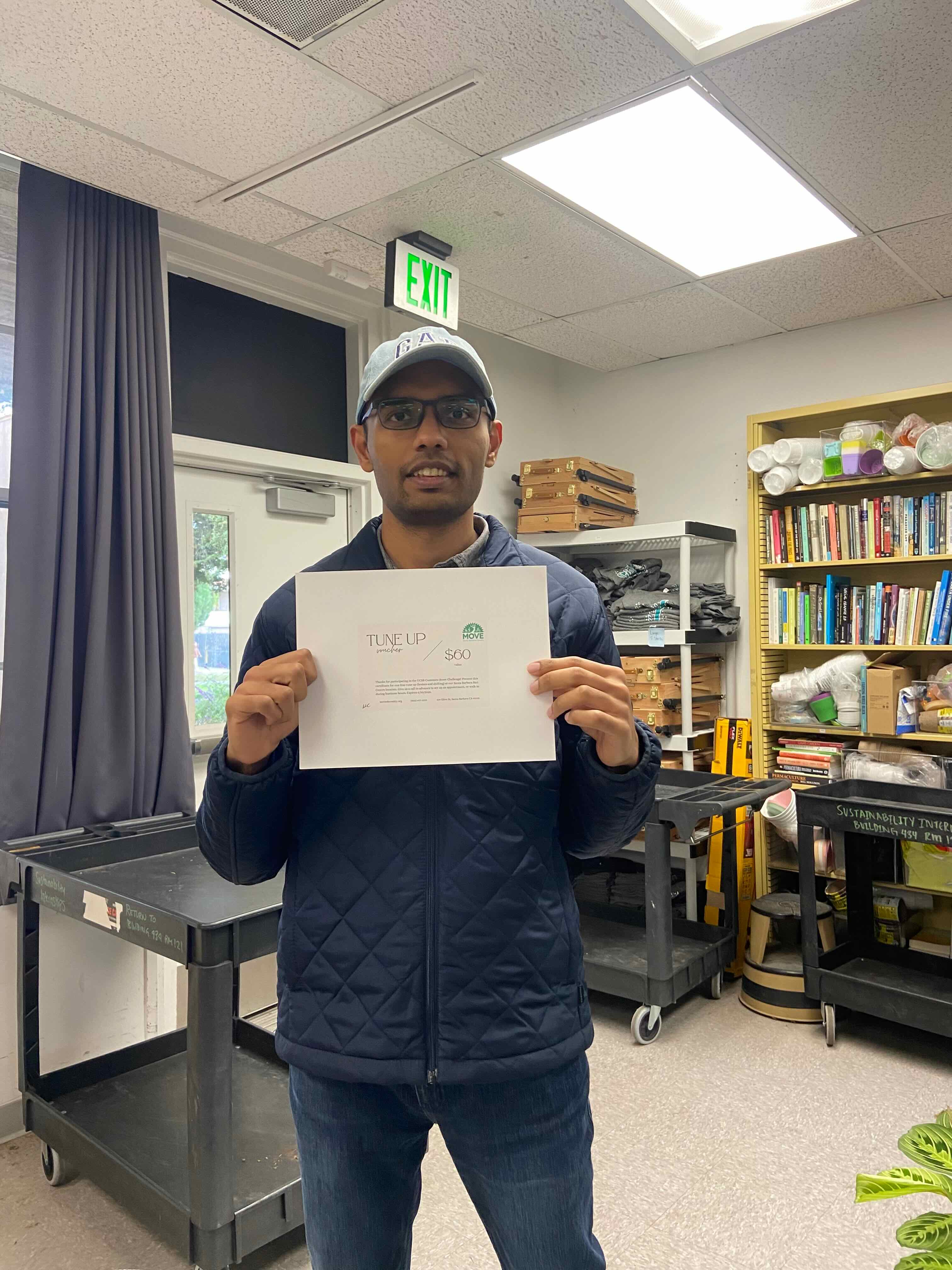 Photo of a participants with their gift card reward