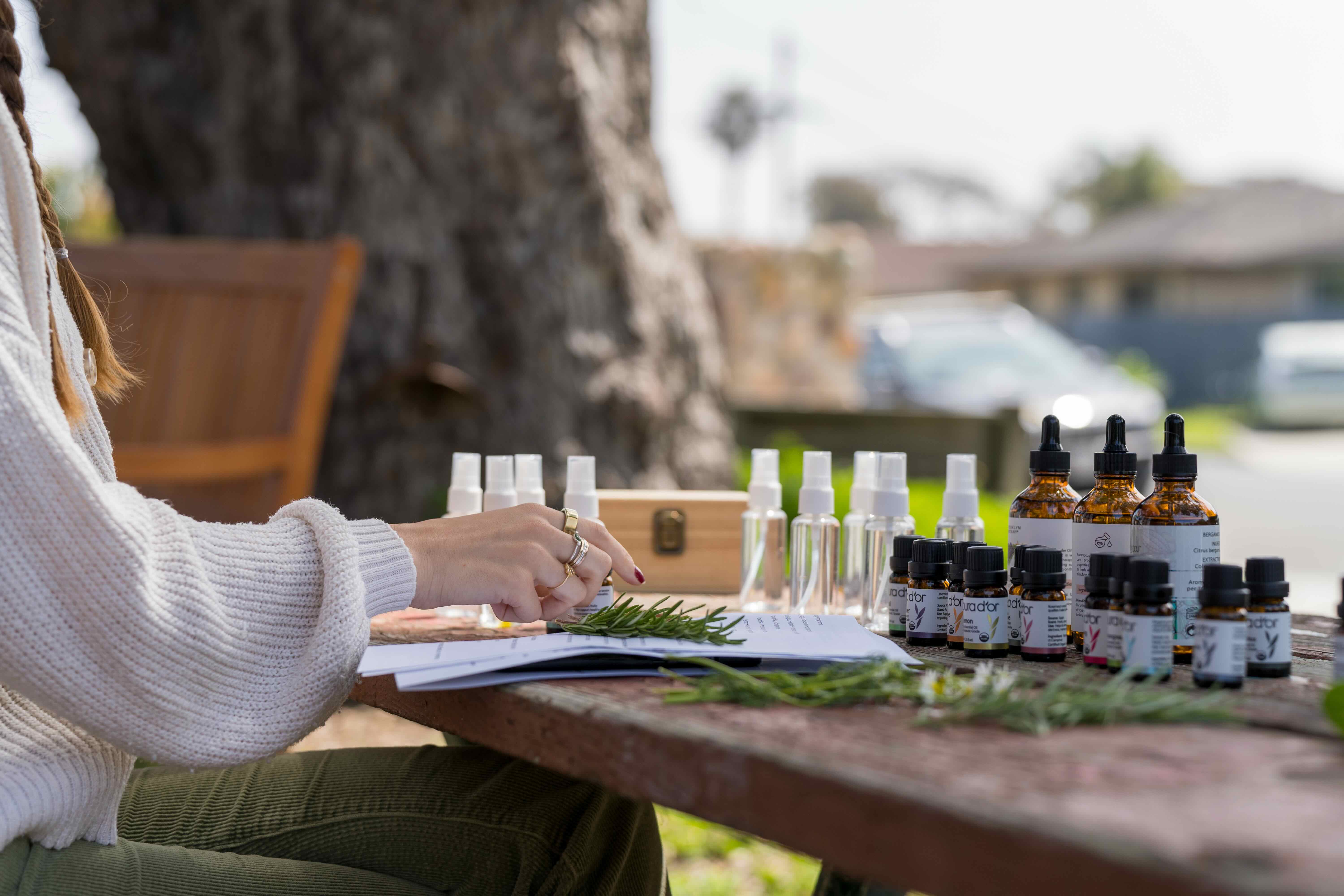 a row of essential oils on a table